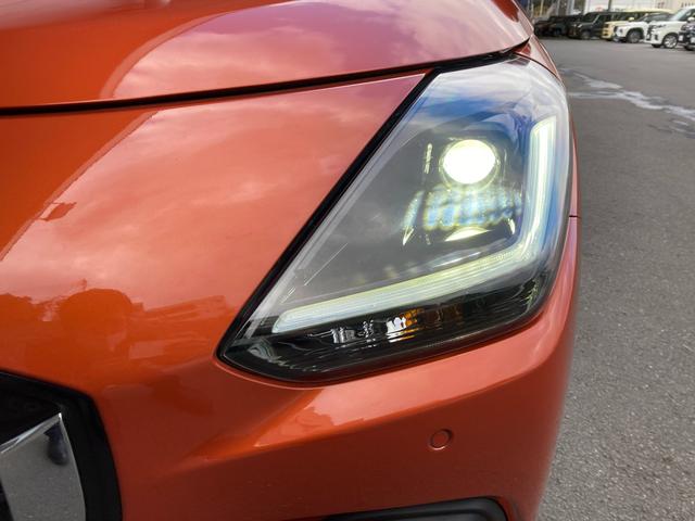 スイフト ＨＹＢＲＩＤ　ＭＺ　衝突被害軽減システム　オートライト　１６インチアルミ　プッシュスタート　パドルシフト　シートヒーター　オートエアコン　アイドリングストップ　ＵＳＢソケット　横滑り防止機能　衝突安全ボディ　盗難防止システム　取扱説明書　メンテナンスノート（14枚目）