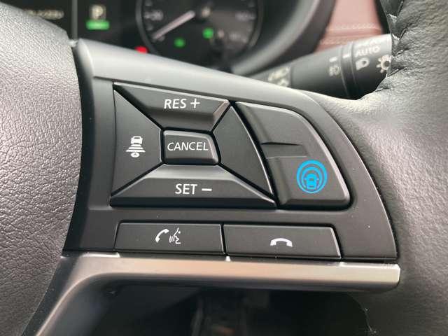 キックス １．２　Ｘ　ツートーン　インテリアエディション　（ｅ－ＰＯＷ　寒冷地仕様・９インチ純正メモリーナビ・ア　ハイビームアシスト　レーンアシスト　前席シートヒーター　フルセグ　全周囲カメラ　ＬＥＤヘッドランプ　踏み間違い防止　アイドリングストップ　スマートキー　ＡＣＣ（9枚目）