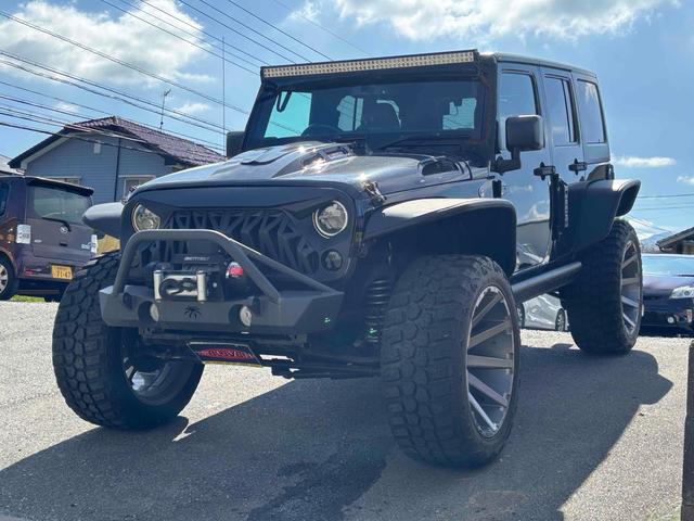 ジープ・ラングラーアンリミテッド スポーツ　４ＷＤ　ＥＴＣ　バックカメラ　オートクルーズコントロール　ナビ　ＴＶ　アルミホイール　ＡＴ　盗難防止システム　ＣＤ　ＤＶＤ再生　ＵＳＢ　Ｂｌｕｅｔｏｏｔｈ　ＡＢＳ　ＥＳＣ　エアコン　パワーウィンドウ（12枚目）