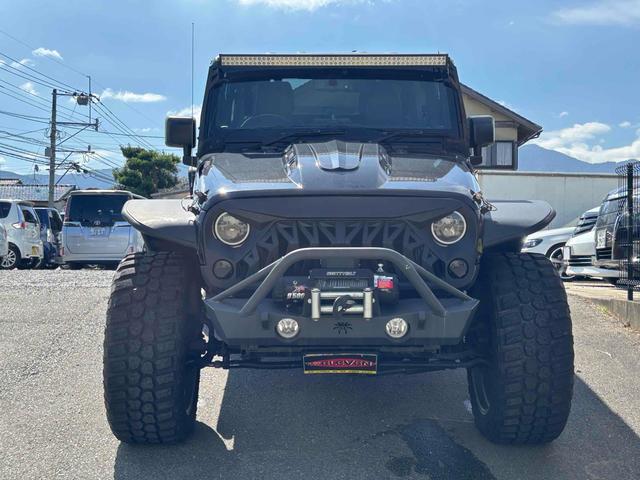 ジープ・ラングラーアンリミテッド スポーツ　４ＷＤ　ＥＴＣ　バックカメラ　オートクルーズコントロール　ナビ　ＴＶ　アルミホイール　ＡＴ　盗難防止システム　ＣＤ　ＤＶＤ再生　ＵＳＢ　Ｂｌｕｅｔｏｏｔｈ　ＡＢＳ　ＥＳＣ　エアコン　パワーウィンドウ（13枚目）