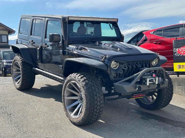 ジープ・ラングラーアンリミテッド スポーツ　４ＷＤ　ＥＴＣ　バックカメラ　オートクルーズコントロール　ナビ　ＴＶ　アルミホイール　ＡＴ　盗難防止システム　ＣＤ　ＤＶＤ再生　ＵＳＢ　Ｂｌｕｅｔｏｏｔｈ　ＡＢＳ　ＥＳＣ　エアコン　パワーウィンドウ（14枚目）