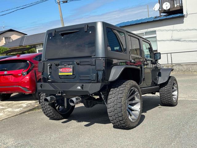 ジープ・ラングラーアンリミテッド スポーツ　４ＷＤ　ＥＴＣ　バックカメラ　オートクルーズコントロール　ナビ　ＴＶ　アルミホイール　ＡＴ　盗難防止システム　ＣＤ　ＤＶＤ再生　ＵＳＢ　Ｂｌｕｅｔｏｏｔｈ　ＡＢＳ　ＥＳＣ　エアコン　パワーウィンドウ（16枚目）