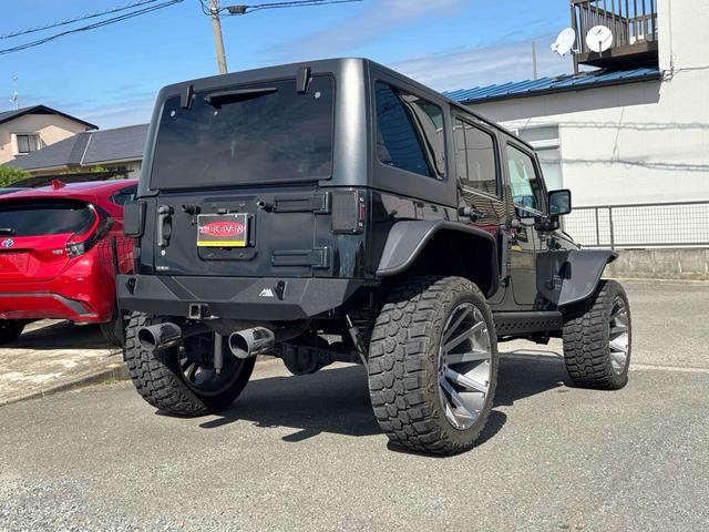 ジープ・ラングラーアンリミテッド スポーツ　４ＷＤ　ＥＴＣ　バックカメラ　オートクルーズコントロール　ナビ　ＴＶ　アルミホイール　ＡＴ　盗難防止システム　ＣＤ　ＤＶＤ再生　ＵＳＢ　Ｂｌｕｅｔｏｏｔｈ　ＡＢＳ　ＥＳＣ　エアコン　パワーウィンドウ（24枚目）