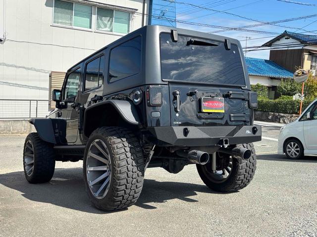 ジープ・ラングラーアンリミテッド スポーツ　４ＷＤ　ＥＴＣ　バックカメラ　オートクルーズコントロール　ナビ　ＴＶ　アルミホイール　ＡＴ　盗難防止システム　ＣＤ　ＤＶＤ再生　ＵＳＢ　Ｂｌｕｅｔｏｏｔｈ　ＡＢＳ　ＥＳＣ　エアコン　パワーウィンドウ（26枚目）