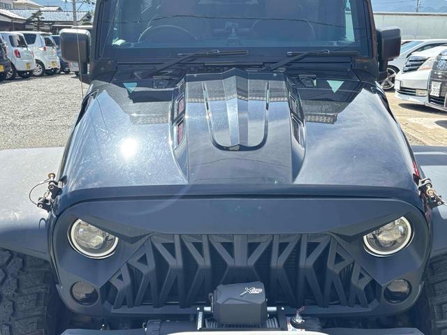 ジープ・ラングラーアンリミテッド スポーツ　４ＷＤ　ＥＴＣ　バックカメラ　オートクルーズコントロール　ナビ　ＴＶ　アルミホイール　ＡＴ　盗難防止システム　ＣＤ　ＤＶＤ再生　ＵＳＢ　Ｂｌｕｅｔｏｏｔｈ　ＡＢＳ　ＥＳＣ　エアコン　パワーウィンドウ（34枚目）