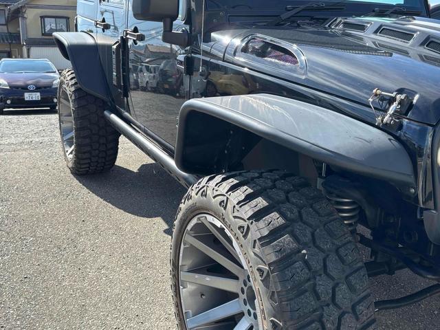 ジープ・ラングラーアンリミテッド スポーツ　４ＷＤ　ＥＴＣ　バックカメラ　オートクルーズコントロール　ナビ　ＴＶ　アルミホイール　ＡＴ　盗難防止システム　ＣＤ　ＤＶＤ再生　ＵＳＢ　Ｂｌｕｅｔｏｏｔｈ　ＡＢＳ　ＥＳＣ　エアコン　パワーウィンドウ（35枚目）