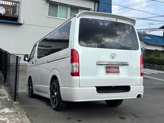 ハイエースバン スーパーＧＬ　ダークプライムＩＩ　ＥＴＣ　バックカメラ　ナビ　ＴＶ　クリアランスソナー　レーンアシスト　衝突被害軽減システム　両側電動スライドドア　オートマチックハイビーム　オートライト　アルミホイール　スマートキー　後席モニター（23枚目）
