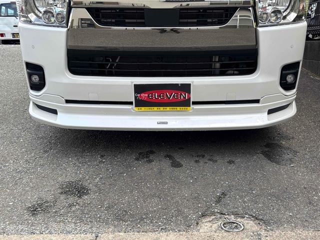 ハイエースバン スーパーＧＬ　ダークプライムＩＩ　ＥＴＣ　バックカメラ　ナビ　ＴＶ　クリアランスソナー　レーンアシスト　衝突被害軽減システム　両側電動スライドドア　オートマチックハイビーム　オートライト　アルミホイール　スマートキー　後席モニター（28枚目）