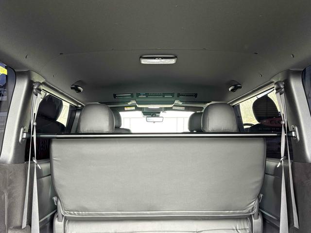 ハイエースバン スーパーＧＬ　ダークプライムＩＩ　ＥＴＣ　バックカメラ　ナビ　ＴＶ　クリアランスソナー　レーンアシスト　衝突被害軽減システム　両側電動スライドドア　オートマチックハイビーム　オートライト　アルミホイール　スマートキー　後席モニター（46枚目）