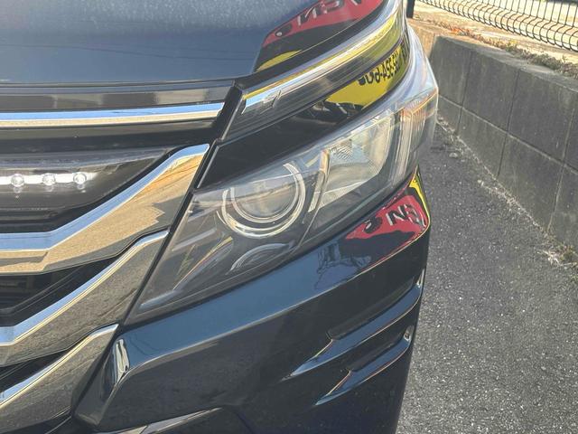 ヴォクシー ハイブリッドＶ　ＥＴＣ　バックカメラ　ナビ　ＴＶ　オートクルーズコントロール　両側電動スライドドア　オートライト　ＬＥＤヘッドランプ　エアロ　スマートキー　電動格納ミラー　シートヒーター　後席モニター　３列シート（22枚目）