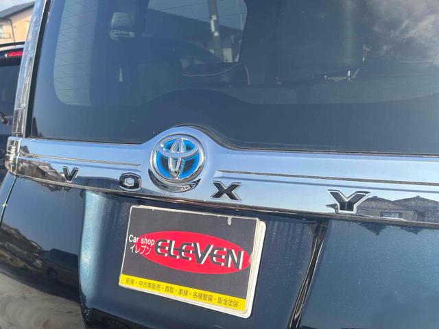 ヴォクシー ハイブリッドＶ　ＥＴＣ　バックカメラ　ナビ　ＴＶ　オートクルーズコントロール　両側電動スライドドア　オートライト　ＬＥＤヘッドランプ　エアロ　スマートキー　電動格納ミラー　シートヒーター　後席モニター　３列シート（38枚目）