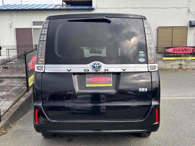 ヴォクシー ハイブリッドＶ　ワンオーナー　ＥＴＣ　バックカメラ　ナビ　ＴＶ　オートクルーズコントロール　両側スライド・片側電動　オートライト　ＬＥＤヘッドランプ　スマートキー　電動格納ミラー　シートヒーター　３列シート　ＣＶＴ（16枚目）