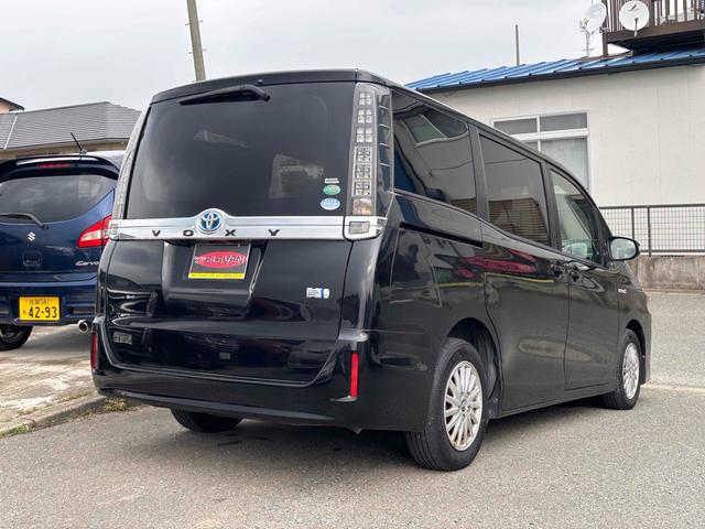 ヴォクシー ハイブリッドＶ　ワンオーナー　ＥＴＣ　バックカメラ　ナビ　ＴＶ　オートクルーズコントロール　両側スライド・片側電動　オートライト　ＬＥＤヘッドランプ　スマートキー　電動格納ミラー　シートヒーター　３列シート　ＣＶＴ（23枚目）