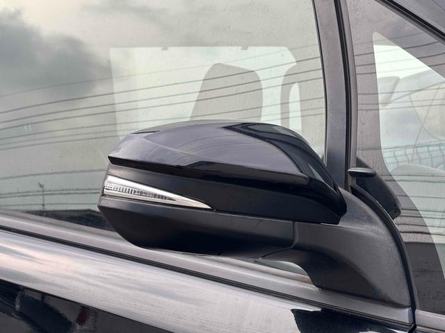 ヴォクシー ハイブリッドＶ　ワンオーナー　ＥＴＣ　バックカメラ　ナビ　ＴＶ　オートクルーズコントロール　両側スライド・片側電動　オートライト　ＬＥＤヘッドランプ　スマートキー　電動格納ミラー　シートヒーター　３列シート　ＣＶＴ（29枚目）