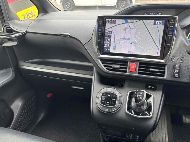 ヴォクシー ハイブリッドＶ　ワンオーナー　ＥＴＣ　バックカメラ　ナビ　ＴＶ　オートクルーズコントロール　両側スライド・片側電動　オートライト　ＬＥＤヘッドランプ　スマートキー　電動格納ミラー　シートヒーター　３列シート　ＣＶＴ（52枚目）