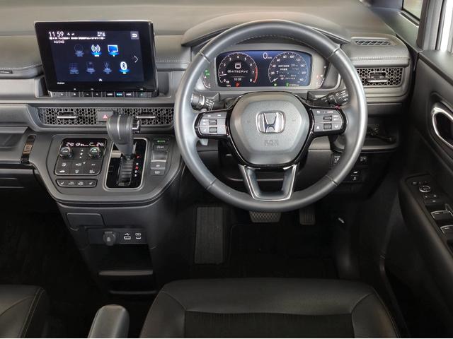 ステップワゴン スパーダ 当社代車使用/純正メモリナビ(フルセグ/CD/DVD/Bluetooth)/パワーバックドア/LEDヘッドライト/両側電動スライド/シートヒーター/オットマン/ホンダセンシング(7枚目)