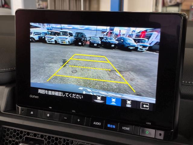 ステップワゴン スパーダ 当社代車使用/純正メモリナビ(フルセグ/CD/DVD/Bluetooth)/パワーバックドア/LEDヘッドライト/両側電動スライド/シートヒーター/オットマン/ホンダセンシング(11枚目)