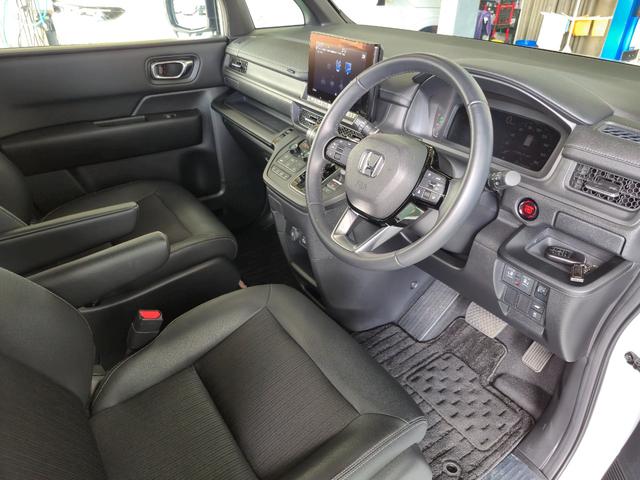 ステップワゴン スパーダ 当社代車使用/純正メモリナビ(フルセグ/CD/DVD/Bluetooth)/パワーバックドア/LEDヘッドライト/両側電動スライド/シートヒーター/オットマン/ホンダセンシング(32枚目)
