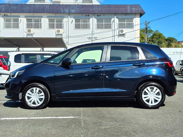 フィット ホーム　当社代車使用／メーカー純正メモリナビ（フルセグ／ＣＤ／ＤＶＤ／Ｂｌｕｅｔｏｏｔｈ／ＵＳＢ）／バックカメラ／ＬＥＤヘッドライト／コーナーセンサー／ブレーキホールド／ホンダセンシング（28枚目）