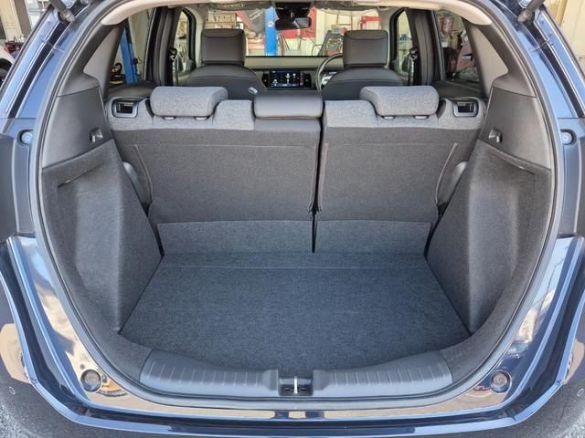 フィット ホーム　当社代車使用／メーカー純正メモリナビ（フルセグ／ＣＤ／ＤＶＤ／Ｂｌｕｅｔｏｏｔｈ／ＵＳＢ）／バックカメラ／ＬＥＤヘッドライト／コーナーセンサー／ブレーキホールド／ホンダセンシング（35枚目）