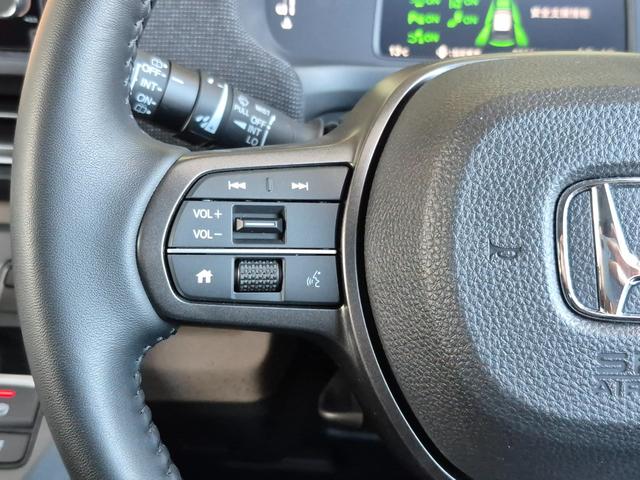 フリード エアーＥＸ　当社代車使用／純正９インチナビ（フルセグ／Ｂｌｕｅｔｏｏｔｈ／ＵＳＢ）／バックカメラ／コーナーセンサー／両側電動スライド／ホンダセンシング／シートヒーター／オートライト（11枚目）