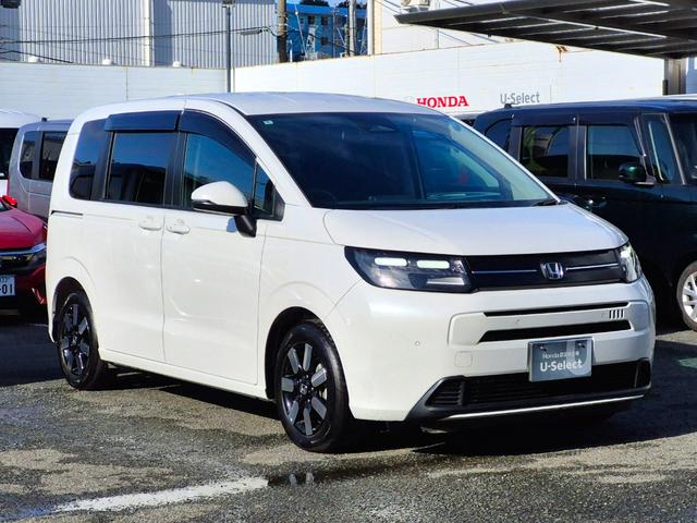 フリード エアーＥＸ　当社代車使用／純正９インチナビ（フルセグ／Ｂｌｕｅｔｏｏｔｈ／ＵＳＢ）／バックカメラ／コーナーセンサー／両側電動スライド／ホンダセンシング／シートヒーター／オートライト（17枚目）