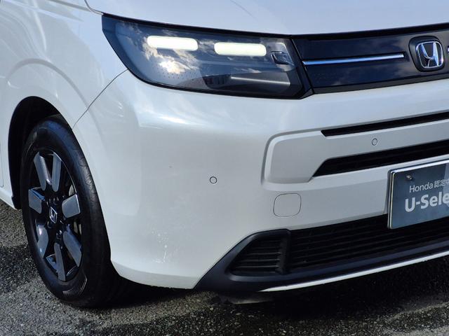 フリード エアーＥＸ　当社代車使用／純正９インチナビ（フルセグ／Ｂｌｕｅｔｏｏｔｈ／ＵＳＢ）／バックカメラ／コーナーセンサー／両側電動スライド／ホンダセンシング／シートヒーター／オートライト（18枚目）