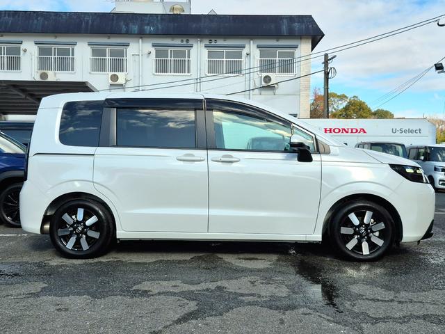 フリード エアーＥＸ　当社代車使用／純正９インチナビ（フルセグ／Ｂｌｕｅｔｏｏｔｈ／ＵＳＢ）／バックカメラ／コーナーセンサー／両側電動スライド／ホンダセンシング／シートヒーター／オートライト（20枚目）