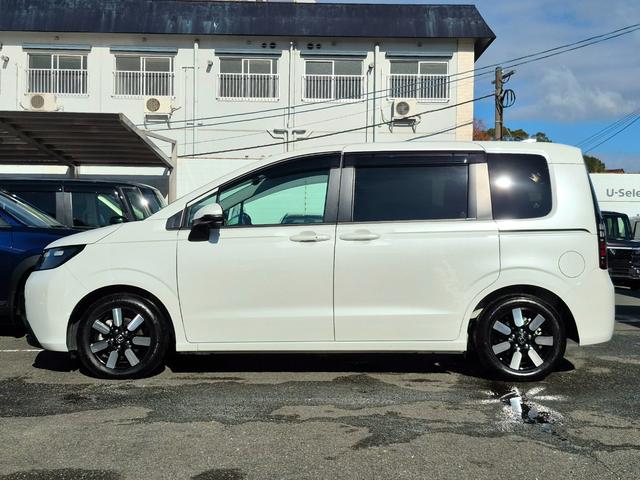 フリード エアーＥＸ　当社代車使用／純正９インチナビ（フルセグ／Ｂｌｕｅｔｏｏｔｈ／ＵＳＢ）／バックカメラ／コーナーセンサー／両側電動スライド／ホンダセンシング／シートヒーター／オートライト（24枚目）