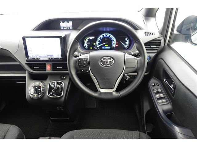 ノア ハイブリッドG Rカメラ スマートキー&プッシュスタート LEDへッドライト ウォークスルー 地デジ イモビライザー 記録簿有 Wエアコン パワーウインドウ アルミ クルコン エアバッグ 横滑り防止 DVD再生機能(4枚目)