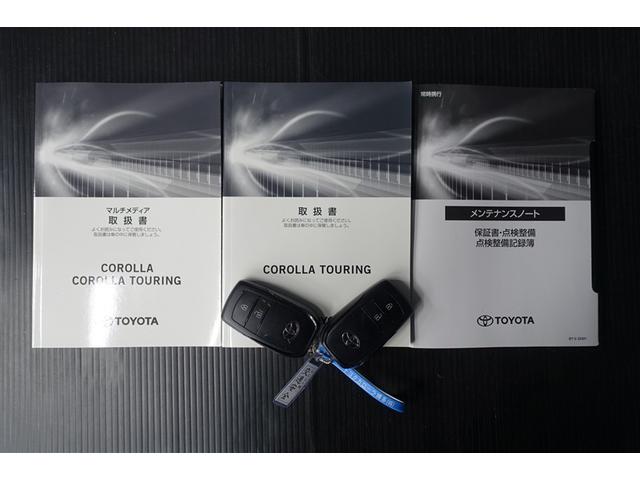 カローラツーリング ハイブリッド　ダブルバイビー　横滑防止装置　ドライブレコーダ　Ｂモニタ－　衝突軽減ブレーキ　フルセグテレビ　Ｉ－ＳＴＯＰ　スマートキ－　ＬＥＤランプ　エアコン　ＡＷ　イモビライザー　クルーズコントロール　ナビＴＶ　点検記録簿（20枚目）