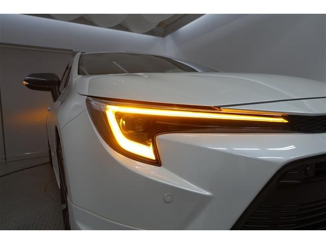 カローラツーリング ハイブリッド　ダブルバイビー　横滑防止装置　ドライブレコーダ　Ｂモニタ－　衝突軽減ブレーキ　フルセグテレビ　Ｉ－ＳＴＯＰ　スマートキ－　ＬＥＤランプ　エアコン　ＡＷ　イモビライザー　クルーズコントロール　ナビＴＶ　点検記録簿（25枚目）