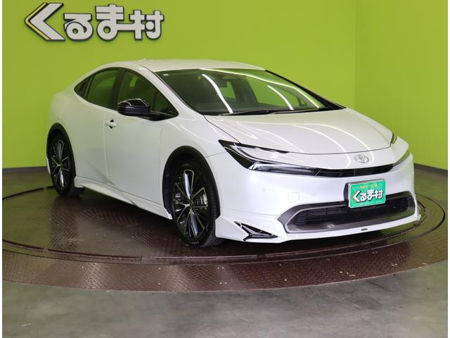 プリウス G/走行12000km/モデリスタエアロ/ 8型フルセグナビ/パノラミックビューM/シートヒーター/レーダークルーズ/プリクラッシュ/BSM/PKSB/革巻ステア/クリアランスソナー/モデリスタエアロ/LED/19AW/CVT(4枚目)