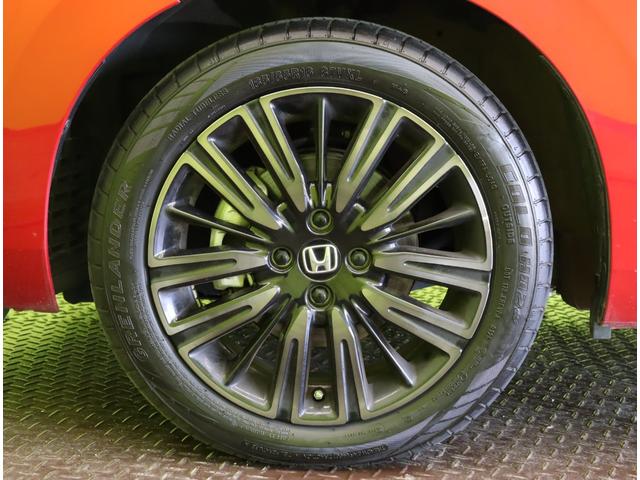 フィット ｅ：ＨＥＶホーム　カーサ／２０周年特別仕様車／　フルセグナビ／Ｂカメラ／ハーフレザー／シートヒーター／アダプティブクルコン／ＣＭＢＳ／路外逸脱抑制／スマートキー／革巻ステア／コーナーセンサー／ミラーウインカー／オートＬＥＤ／１６ＡＷ（71枚目）