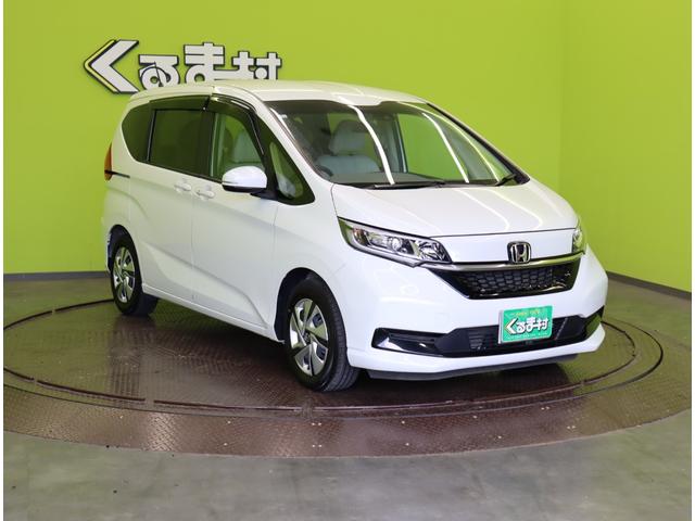 フリードハイブリッド ハイブリッド・G/ホンダセンシング/6人乗/ 9型フルセグナビ/Bカメラ/両側自動ドア/CMBS/アダプティブクルーズ/LKA/スマートキー/シートヒーター/ETC/ドラレコ/ミラーウインカー/オートLED/7AT/6人乗り(4枚目)