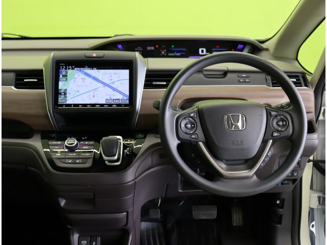 フリードハイブリッド ハイブリッド・G/ホンダセンシング/6人乗/ 9型フルセグナビ/Bカメラ/両側自動ドア/CMBS/アダプティブクルーズ/LKA/スマートキー/シートヒーター/ETC/ドラレコ/ミラーウインカー/オートLED/7AT/6人乗り(11枚目)