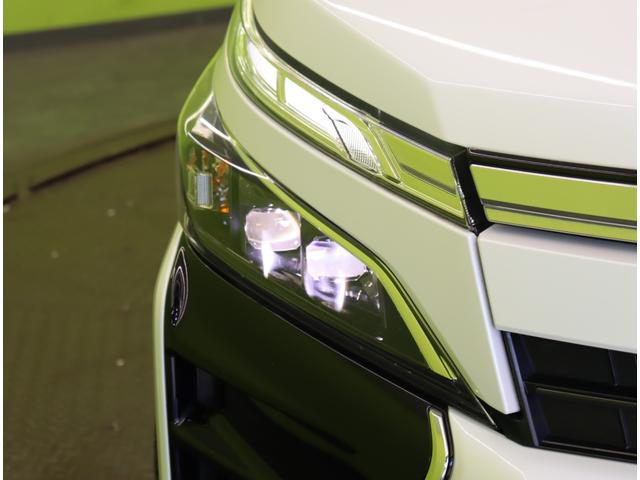 ヴォクシー ＺＳ　煌ＩＩＩ／１０型ナビ／フリップダウンＭ／７人乗／　１０型フルセグナビ／Ｂカメラ／フリップダウンＭ／両側自動ドア／革調シートカバー／スマートキー／ウッドコンビＨ／セーフティセンス／クリアランスソナー／オートＬＥＤ／モデリスタ１８ＡＷ／ＣＶＴ（57枚目）