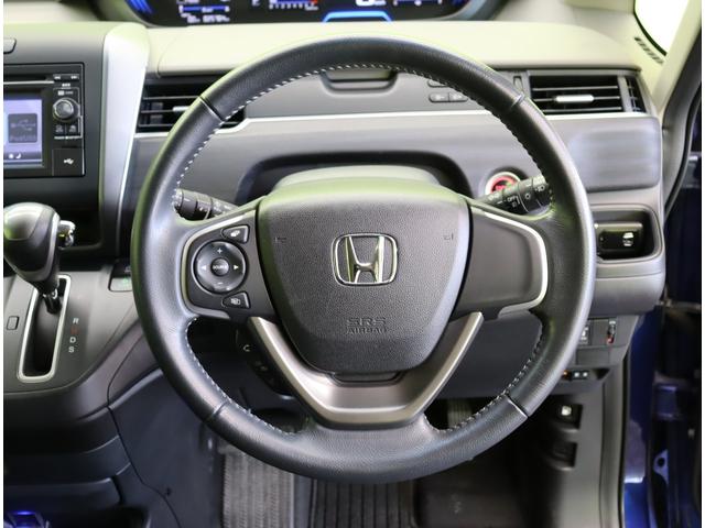 フリード Ｇ／モデューロエアロ／６人乗／　Ｄオーディオ／カメラ／ポータブルナビ／左側自動ドア／スマートキー／ＥＴＣ／革巻ステア／ハーフレザー／ミラーウインカー／オートＬＥＤ／フォグライト／１５ＡＷ／ＣＶＴ／６人乗り（20枚目）