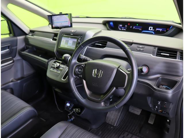 フリード Ｇ／モデューロエアロ／６人乗／　Ｄオーディオ／カメラ／ポータブルナビ／左側自動ドア／スマートキー／ＥＴＣ／革巻ステア／ハーフレザー／ミラーウインカー／オートＬＥＤ／フォグライト／１５ＡＷ／ＣＶＴ／６人乗り（31枚目）