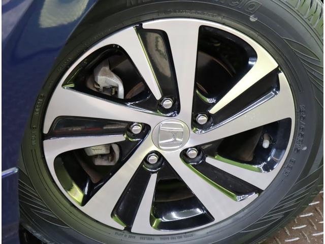 フリード Ｇ／モデューロエアロ／６人乗／　Ｄオーディオ／カメラ／ポータブルナビ／左側自動ドア／スマートキー／ＥＴＣ／革巻ステア／ハーフレザー／ミラーウインカー／オートＬＥＤ／フォグライト／１５ＡＷ／ＣＶＴ／６人乗り（56枚目）