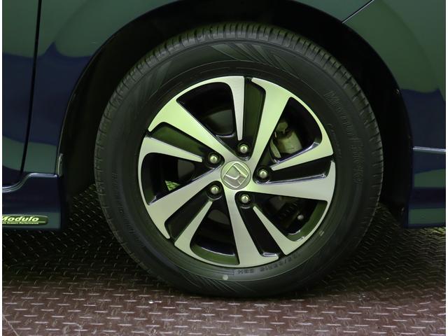 フリード Ｇ／モデューロエアロ／６人乗／　Ｄオーディオ／カメラ／ポータブルナビ／左側自動ドア／スマートキー／ＥＴＣ／革巻ステア／ハーフレザー／ミラーウインカー／オートＬＥＤ／フォグライト／１５ＡＷ／ＣＶＴ／６人乗り（66枚目）