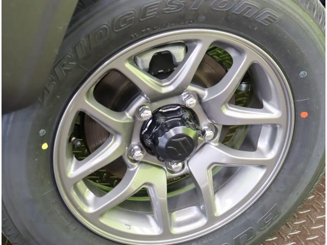 ジムニー ＸＣ／登録済未使用車／　デュアルセンサーブレーキサポート／アダプティブクルコン／シートヒーター／スマートキー／革巻ステア／ハイビームアシスト／ＬＥＤライト／背面タイヤ／Ｆ＆Ｒソナー／１６ＡＷ／５ＭＴ（44枚目）