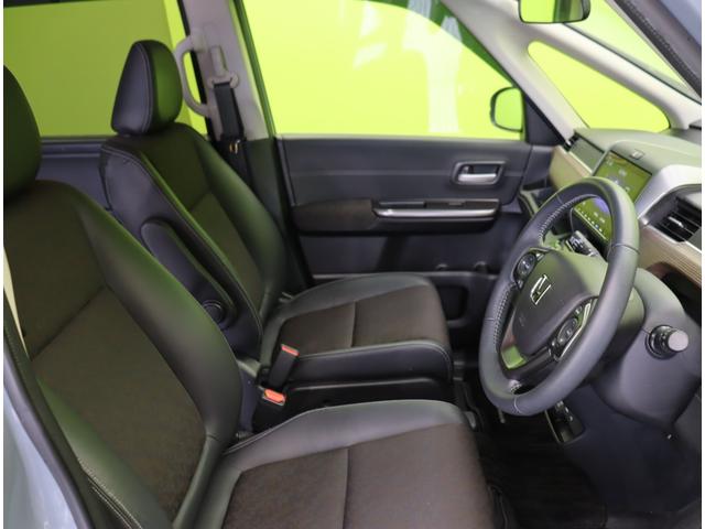 フリードハイブリッド ハイブリッド・クロスター　ブラックスタイル／６人乗／　９型フルセグナビ／Ｂカメラ／両側自動ドア／ハーフレザー／アダプティブクルコン／ＣＭＢＳ／スマートキー／ＥＴＣ／ドラレコ／ルーフレール／オートＬＥＤ／ミラーウインカー／１５ＡＷ／７ＡＴ（34枚目）