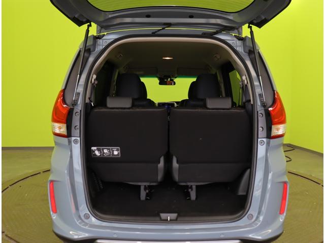 フリードハイブリッド ハイブリッド・クロスター　ブラックスタイル／６人乗／　９型フルセグナビ／Ｂカメラ／両側自動ドア／ハーフレザー／アダプティブクルコン／ＣＭＢＳ／スマートキー／ＥＴＣ／ドラレコ／ルーフレール／オートＬＥＤ／ミラーウインカー／１５ＡＷ／７ＡＴ（44枚目）