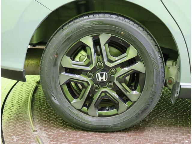 フリードハイブリッド ハイブリッド・クロスター　ブラックスタイル／６人乗／　９型フルセグナビ／Ｂカメラ／両側自動ドア／ハーフレザー／アダプティブクルコン／ＣＭＢＳ／スマートキー／ＥＴＣ／ドラレコ／ルーフレール／オートＬＥＤ／ミラーウインカー／１５ＡＷ／７ＡＴ（70枚目）