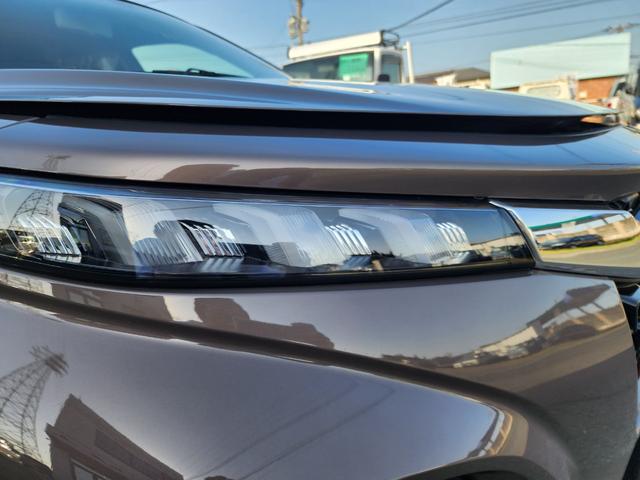 フロンクス 全方位カメラ　純正９インチナビ　登録済未使用車　２トンカラー　全方位カメラ　純正９インチナビ　フルセグＴＶ　スズキコネクト対応通信機装着車　オートクルーズ　ＬＥＤヘッドランプ　オートライト　シートヒーター　１６インチアルミホイール　ブラインドスポットモニター（35枚目）