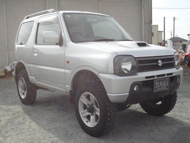 ジムニー ＸＣ　インタークーラーターボ　５速ミッション　４ＷＤ　リフトアップ　純正アルミ　社外マフラー　ナビ　テレビ　サイドシルガード（2枚目）