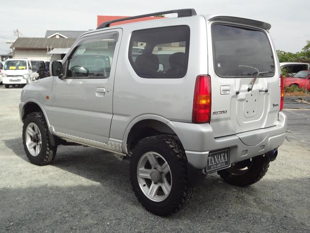 ジムニー ＸＣ　インタークーラーターボ　５速ミッション　４ＷＤ　リフトアップ　純正アルミ　社外マフラー　ナビ　テレビ　サイドシルガード（6枚目）