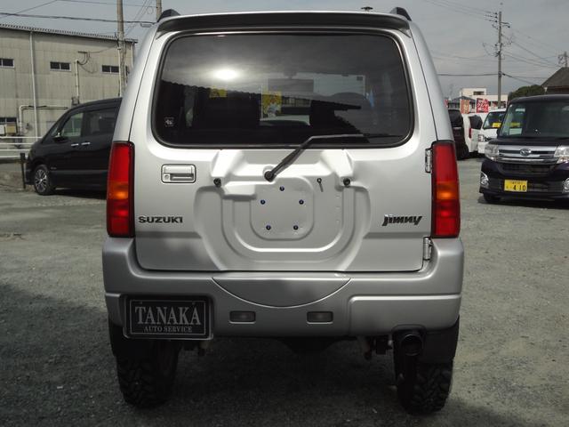 ジムニー ＸＣ　インタークーラーターボ　５速ミッション　４ＷＤ　リフトアップ　純正アルミ　社外マフラー　ナビ　テレビ　サイドシルガード（7枚目）