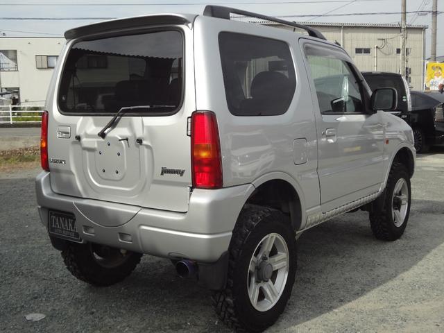 ジムニー ＸＣ　インタークーラーターボ　５速ミッション　４ＷＤ　リフトアップ　純正アルミ　社外マフラー　ナビ　テレビ　サイドシルガード（8枚目）